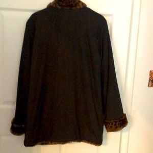 Alpine Co ladies fully reversible coat. Faux animal print reverses to waterproof